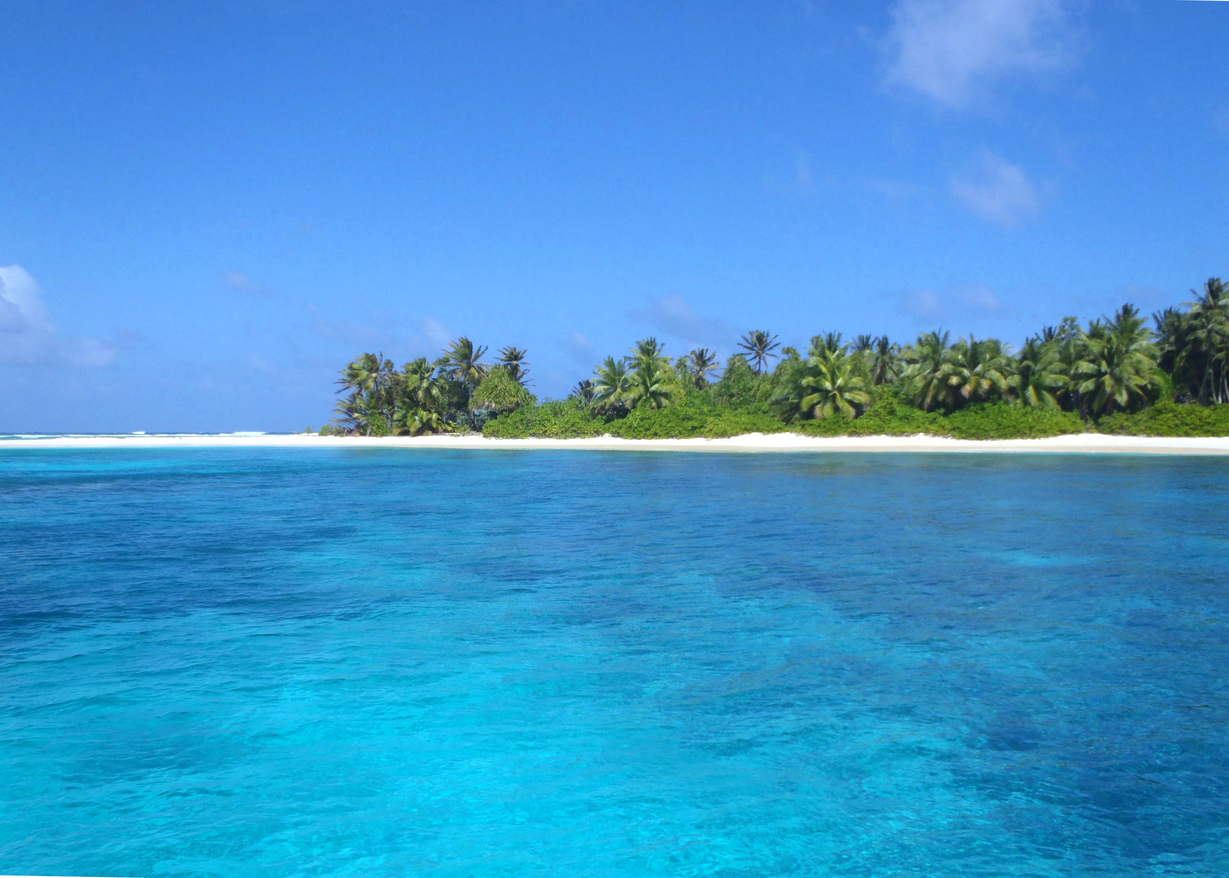 An aerial view illustrating the low-lying nature of the Marshall Islands, highly vulnerable to sea-level rise.