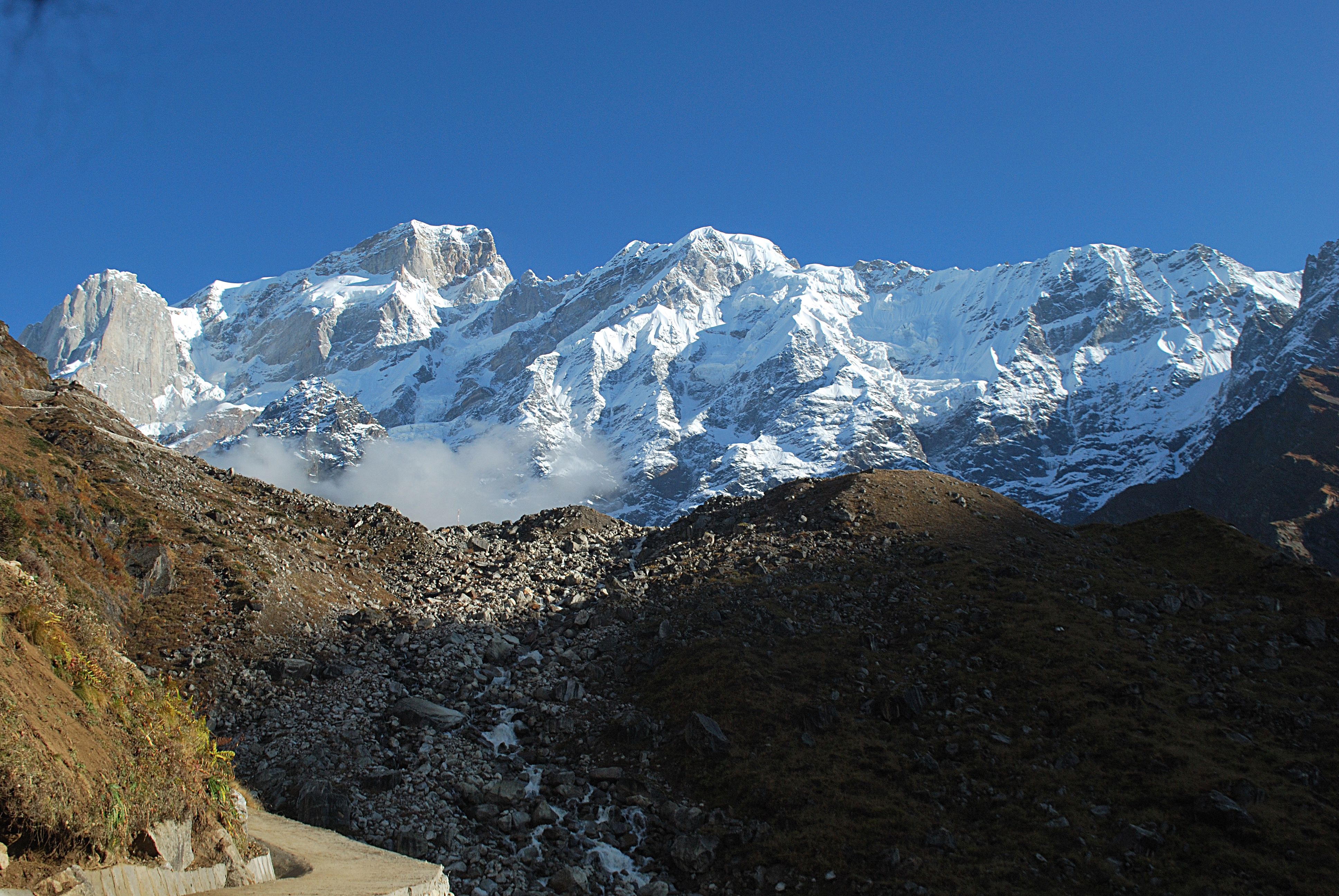 The Kedar range of the Greater Himalayas rises behind the Kedarnath Temple in the Indian state of Uttarakhand. Snow melt from the glaciers, like those behind Kedarnath which form the Mandakini river, a headstream of the Ganges, is crucial for river flows but is threatened by climate change.