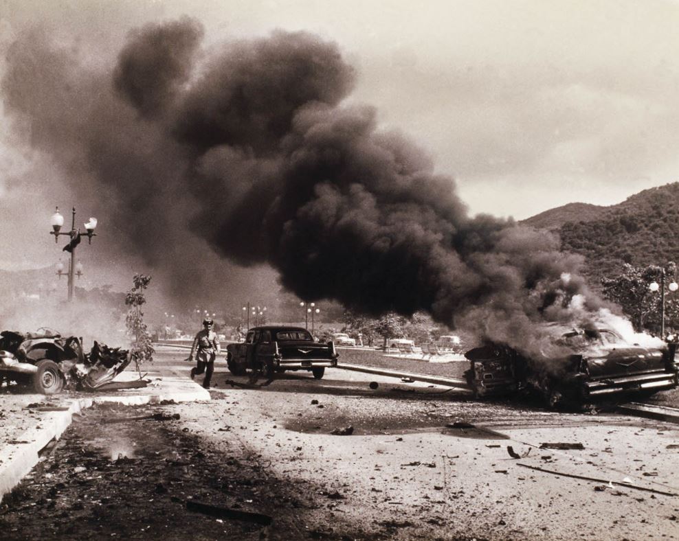 Hậu quả của vụ ám sát ngày 24 tháng 6 năm 1960 tại Caracas, làm bị thương tổng thống Venezuela và Bộ trưởng Quốc phòng của ông, đồng thời giết chết một đại tá không quân và một cảnh sát viên. Vào tháng 8, OAS đã bỏ phiếu nhất trí lên án Cộng hòa Dominica vì hành vi xâm lược và áp đặt lệnh cấm vận vũ khí.
