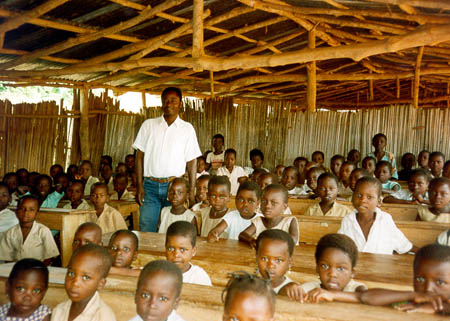 Students in a Beninese classroom, where French is the language of instruction in later years.