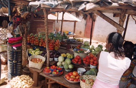 A market stall selling vegetables in Dinguiraye Prefecture. Markets are central to Guinean social and economic life.