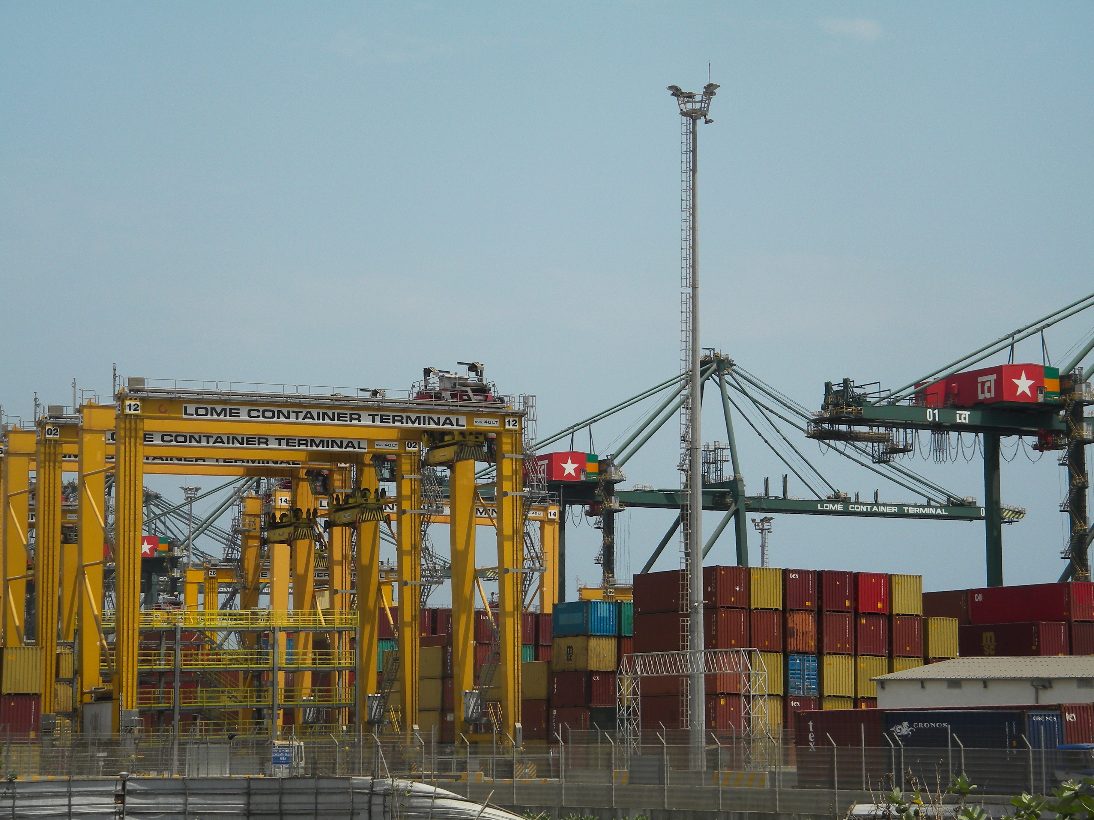 Container handling operations at the Port of Lomé, a key maritime gateway for Togo and neighboring landlocked countries.