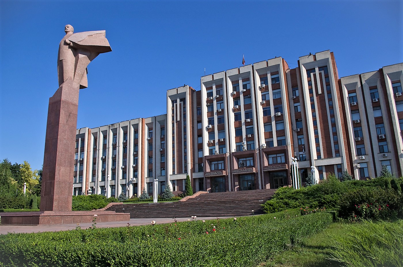The Supreme Council (parliament) building in Tiraspol, fronted by a statue of Vladimir Lenin, reflecting the region's Soviet legacy.