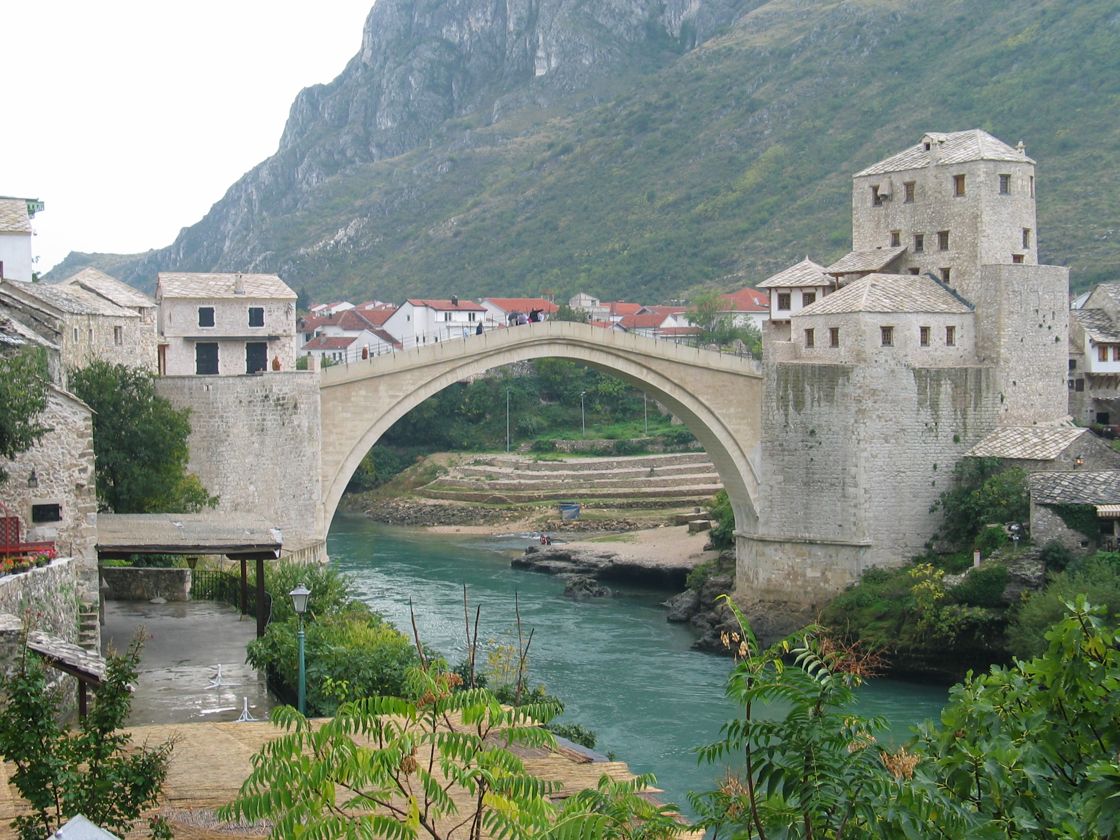 The Stari Most (Old Bridge) in Mostar, originally commissioned by Suleiman the Magnificent in 1557 and rebuilt after its destruction in the Bosnian War.