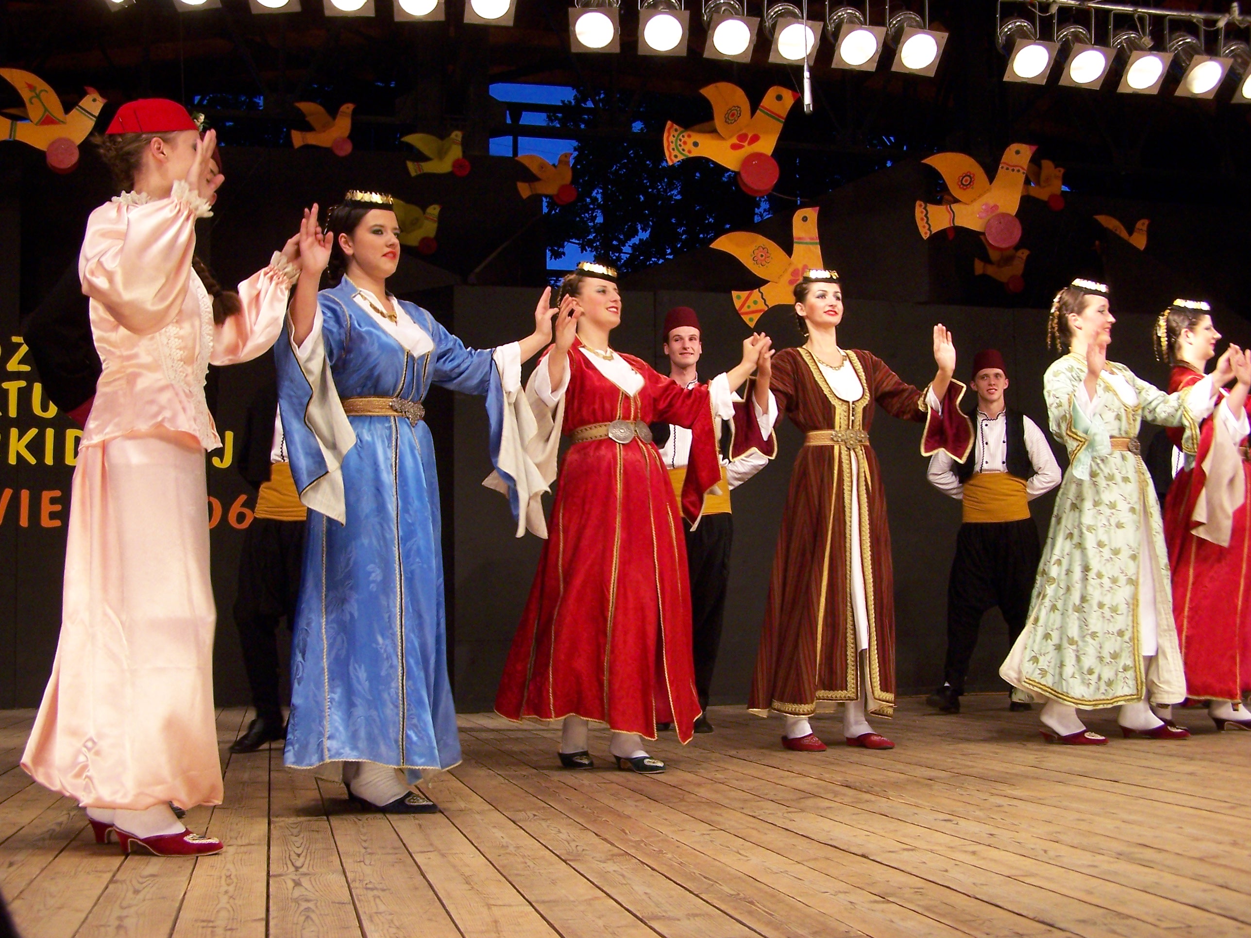 Bosniaks dancing a traditional kolo, a common folk dance in the region.
