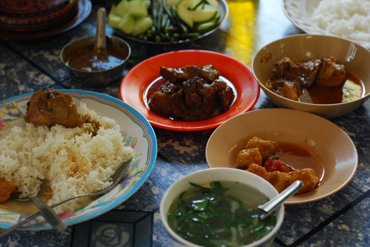 Traditional Burmese cuisine often includes soup, rice, various meat curries, and ngapi (a condiment) with tohsaya (dipping vegetables).