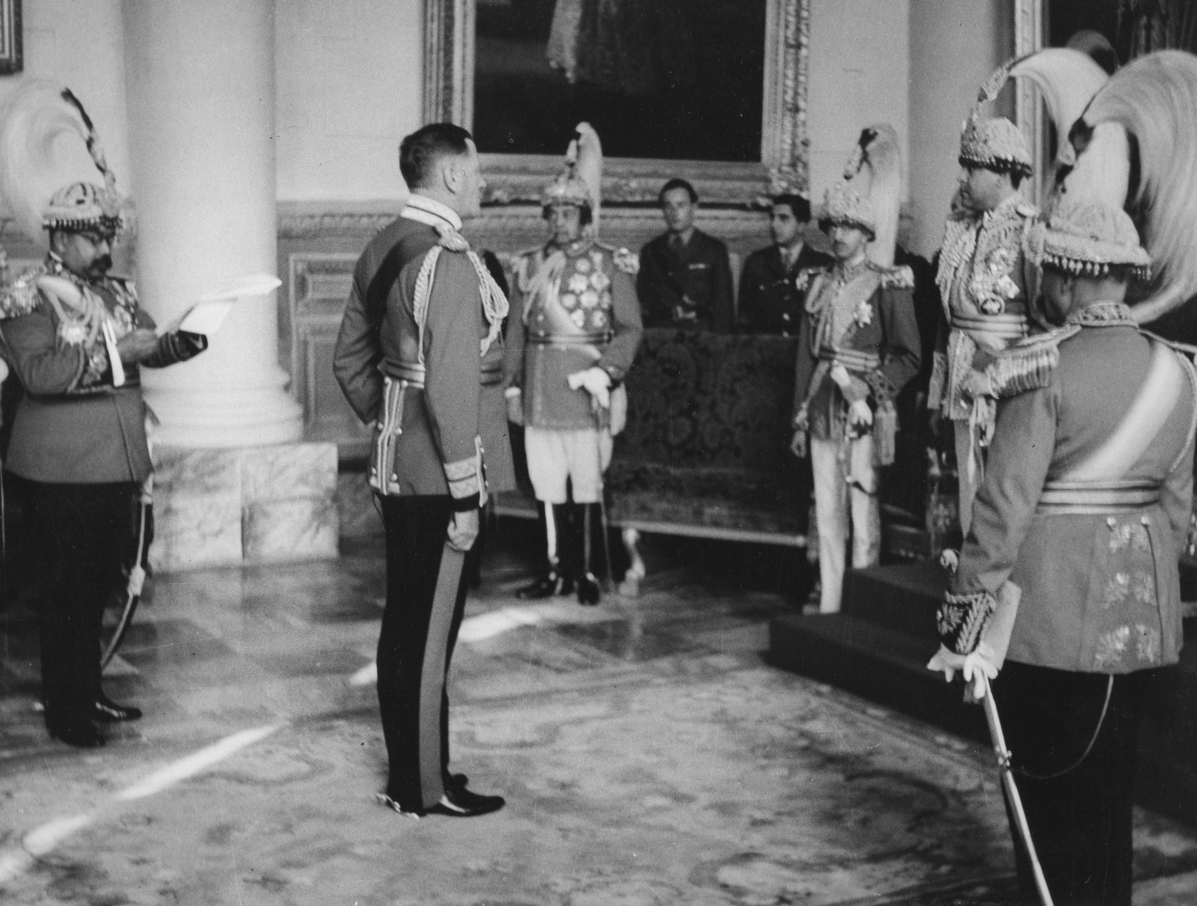 King Tribhuvan giving an audience to British General Claude Auchinleck in the royal palace in Kathmandu, 1945.