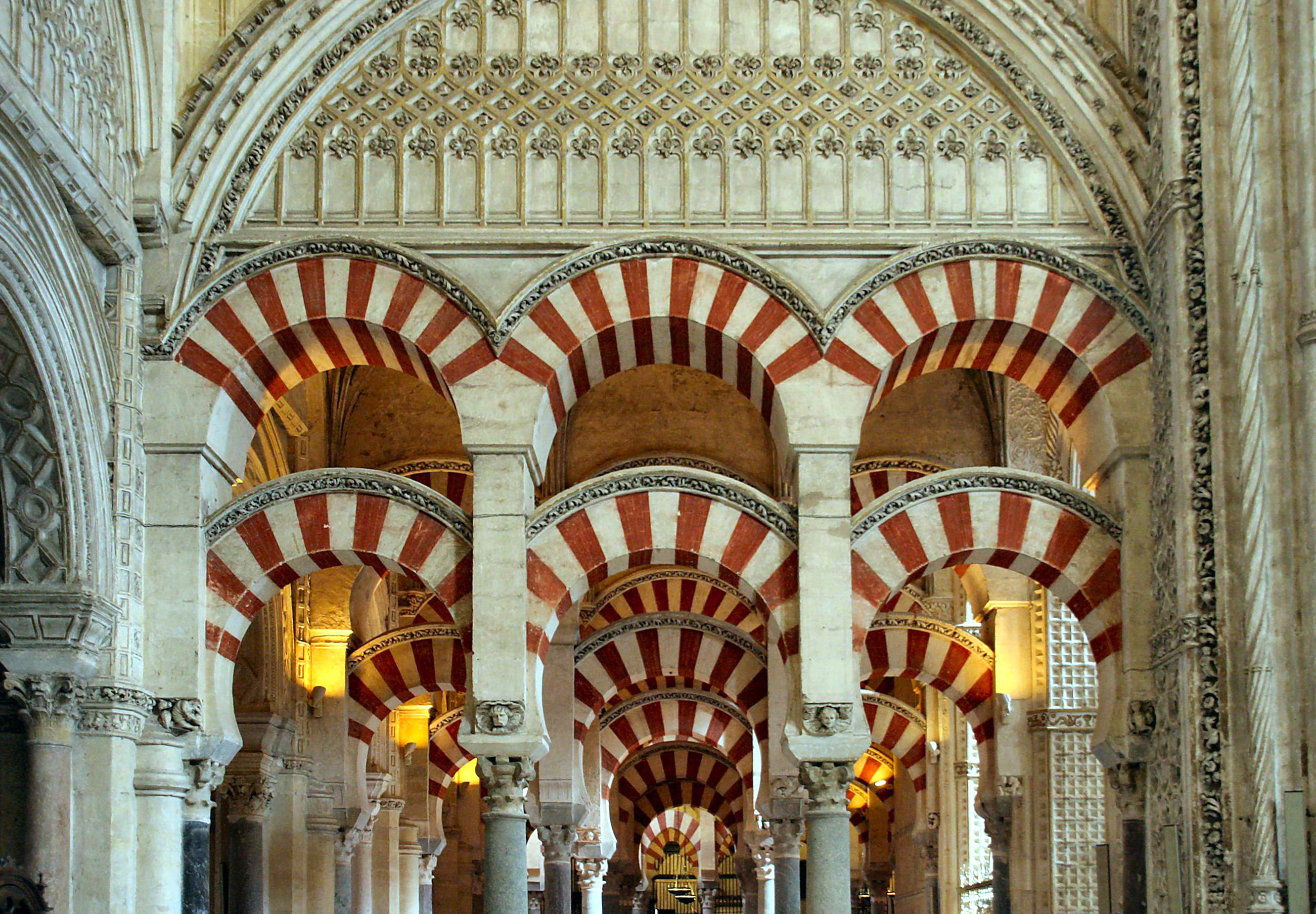 Interior of the Mezquita-Catedral of Córdoba, originally a Visigothic church, converted into a grand mosque during Umayyad rule, and later reconsecrated as a cathedral.