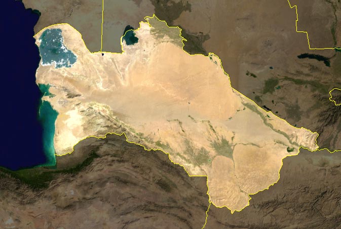 A satellite image of Turkmenistan; the vast, sparsely populated desert regions contrast with the areas where state control heavily impacts daily life and human rights.